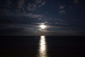 moonlight over the sea at spiaggia di porto luna near villasimius sardinia
