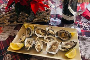 eating oysters at La Terrazza su Figarolo in Golfo Aranci