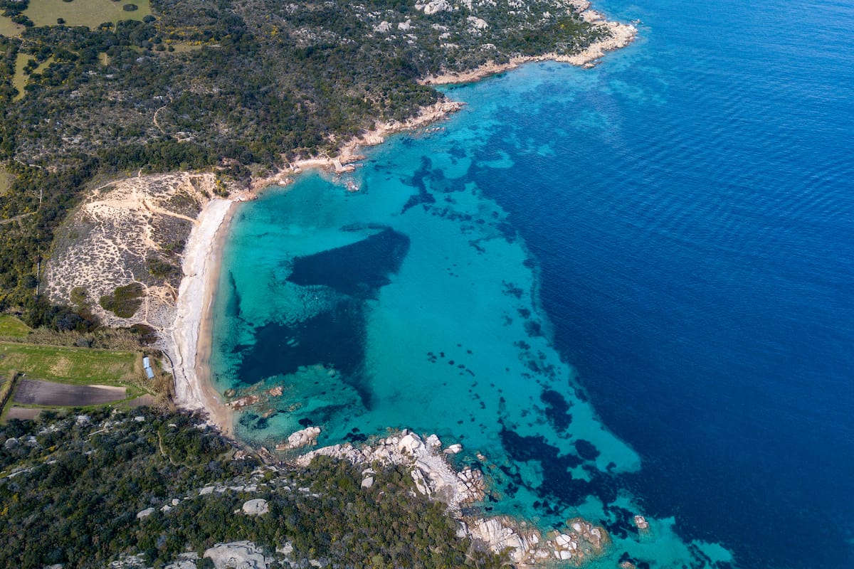 an aerial view of Spiaggia di cala di trana in north Sardinia
