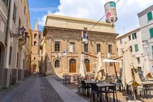 View of a small square in medieval Alghero, Sardinia, Italy.