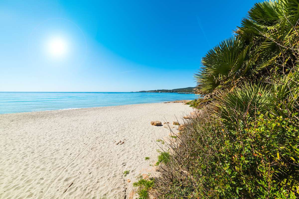 A view of Spiaggia delle Bombarde on a quiet summer's day, near Alghero, northwest Sardinia, Italy.