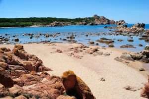 A summer day's view from the beach at Spiaggia di Cala Canneddi, in north Sardinia, Italy.